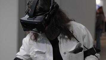 Immersive Virtual Reality Experience in Action, Person in Headset Engaged in Digital Simulation video