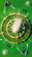 a circular fountain with water and jets in the middle video