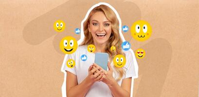 A woman with long blonde hair smiles happily while holding her smartphone. She is engaged in chatting and posting on social media. Colorful emojis surround her, enhancing the cheerful mood. photo