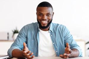 Online Interview. Device Screenshot With Smiling Black Guy Making Call, Positive Millennial African American Hr Manager Having Web Chat With Potential Employee, Talking At Camera, Webcam View photo