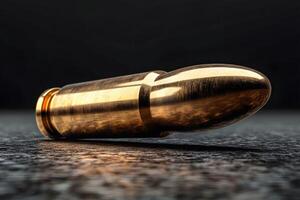 Detailed Close-Up of a Golden Bullet on Textured Surface for Design and Education photo