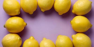 Frame of Lemons on Purple Background Citrus Fruits Arranged in Circle Food Photography photo