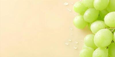 Fresh Green Grapes with Water Drops on Beige Background photo