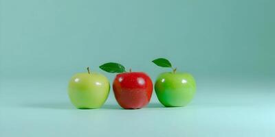 three apples are arranged in a row on a green surface photo