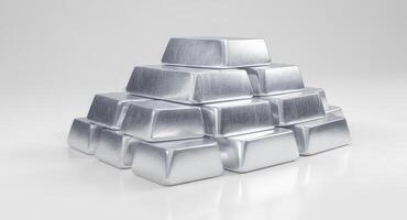 A large pile of gleaming aluminum ingots stacked in a pyramid shape on a white surface photo