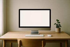 Modern minimalist home office desk with blank computer monitor and potted plant photo