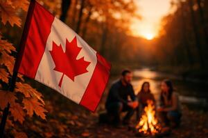 Vibrant canadian flag waving in golden autumn forest with blurry family campfire scene photo