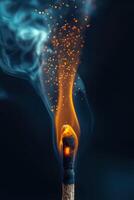 Burning match with sparks and smoke creating a dynamic scene photo