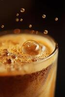 Sparkling bubbles rising in a glass of carbonated drink photo