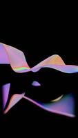 a rainbow colored wave is reflected in the water video