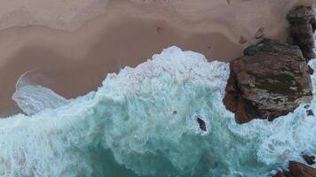 Ursa Beach, Sea Stacks, Cliffs and Atlantic Ocean Waves in Evening. Portugal. Aerial Overhead Top-Down View video