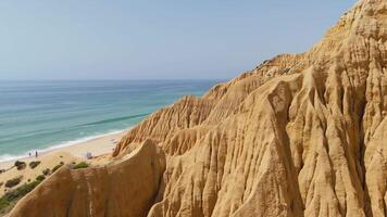 Gale Beach and Hoodoos Cliffs on Sunny Day. Atlantic Ocean, Portugal. Aerial View. Moving Forward video