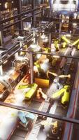 CGI robotic arms in a car factory video