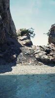 Photorealistic concept of CGI coastal view of a sand beach with cliffs video