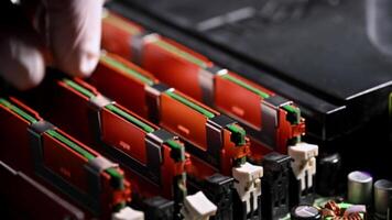 Close-up of Technicians Installing High-Performance RAM Modules in a Modern Computer System video