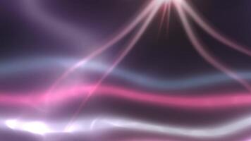 Luminous pink and purple light streaks gliding gracefully across dark background, creating mesmerizing abstract motion with fluid energy and vibrant visual dynamics. video