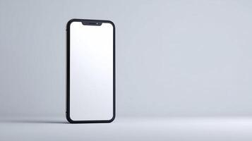 An iphone with a blank screen on a white surface photo