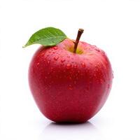 Fresh Red Apple with Water Droplets and Green Leaf Isolated on a White Background photo