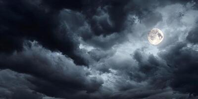 Full Moon in Dark Cloudy Night Sky Nighttime Scene photo