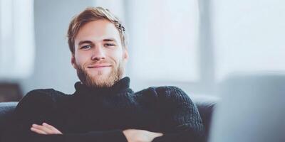 Smiling Young Man with Blond Hair Wearing Black Turtleneck Sweater photo