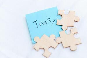 Building business trust a puzzle of relationships office space visual content professional environment close-up connection concept photo