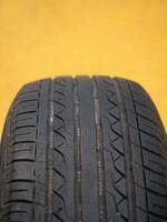 Tire inspection process automotive workshop technical guide indoor environment close-up view safety importance for drivers photo