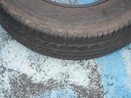 Tire maintenance tips for car owners urban garage informative guide automotive environment close-up view practical advice for longevity photo