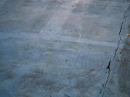 Cracked concrete surface urban area texture photography industrial environment close-up view urban decay concept photo