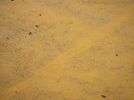 Exploring the textured surface of yellow sand natural landscape detailed photography outdoor environment close-up view nature's beauty photo