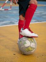 Youth soccer practice urban playground action shot colorful environment close-up perspective team spirit in motion photo