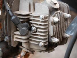Engine component inspection workshop mechanical part close-up view engineering concept for maintenance and repair photo
