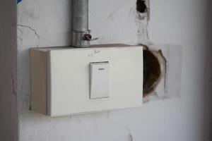 Light switch installation process residential area home improvement indoor setting close-up view diy tips and techniques photo