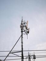 Telecommunication tower installation urban area infrastructure development clear sky elevated view modern connectivity solutions photo