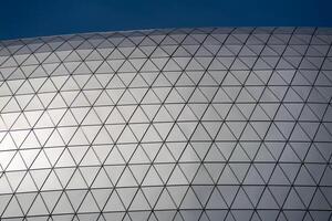 Geometric architecture detail urban environment high-resolution image modern design close-up view innovative structure photo