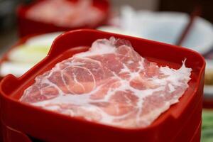 Sizzling beef slice preparation asian restaurant culinary art cozy environment close-up view food experience photo