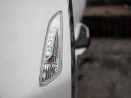 Vehicle detail close-up automotive scene image capture urban environment focused view technology insights photo