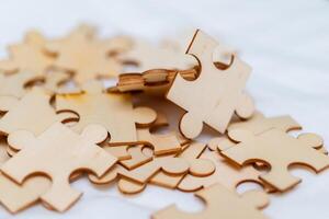 Creative business strategies puzzle assembly visual content indoor close-up problem-solving mindset photo