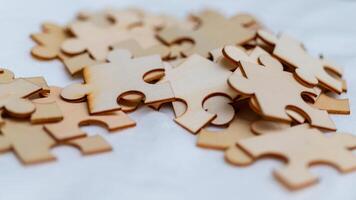 Puzzle pieces representing business strategy and collaboration concepts in a creative workspace environment photo