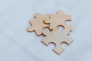 Strategizing business growth puzzle piece collaboration in a creative workspace environment photo