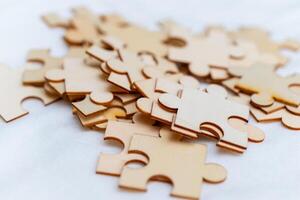 Puzzle assembly event home office creative activity indoor environment close-up view business focus for team building photo
