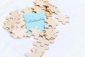 Enhancing business collaboration through puzzle pieces office setting visual content creative environment close-up view teamwork concept photo
