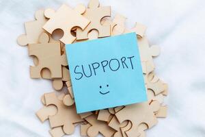 Supporting business growth puzzle pieces of teamwork office space image of collaboration positive environment motivational concept photo
