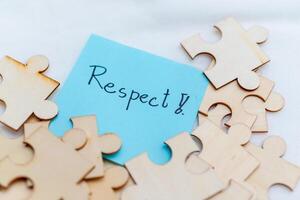 Promoting business values respect in team dynamics office setting inspirational message collaborative environment close-up view leadership concepts photo