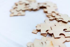 Strategic business puzzle solving session office team collaboration professional environment close-up view problem-solving concept photo