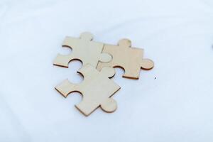 Business strategy puzzle pieces office workspace conceptual image creative environment close-up view collaboration ideas for success photo
