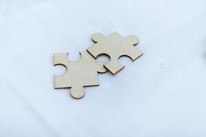 Collaborative business puzzle solving office space visual content minimalist environment close-up view strategic thinking approach photo