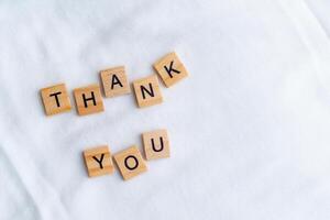 Thank you message in business context home office inspirational content simple environment top-down view gratitude concept photo