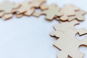 Puzzle pieces representing business strategy creative workspace digital content collaborative environment close-up view conceptual insight photo