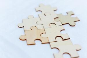 Strategic business puzzle solving office workspace conceptual image collaborative environment close-up view problem-solving concept photo