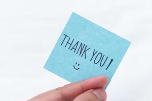 Thank you note business appreciation gesture home office personal message minimalist environment close-up view gratitude concept photo